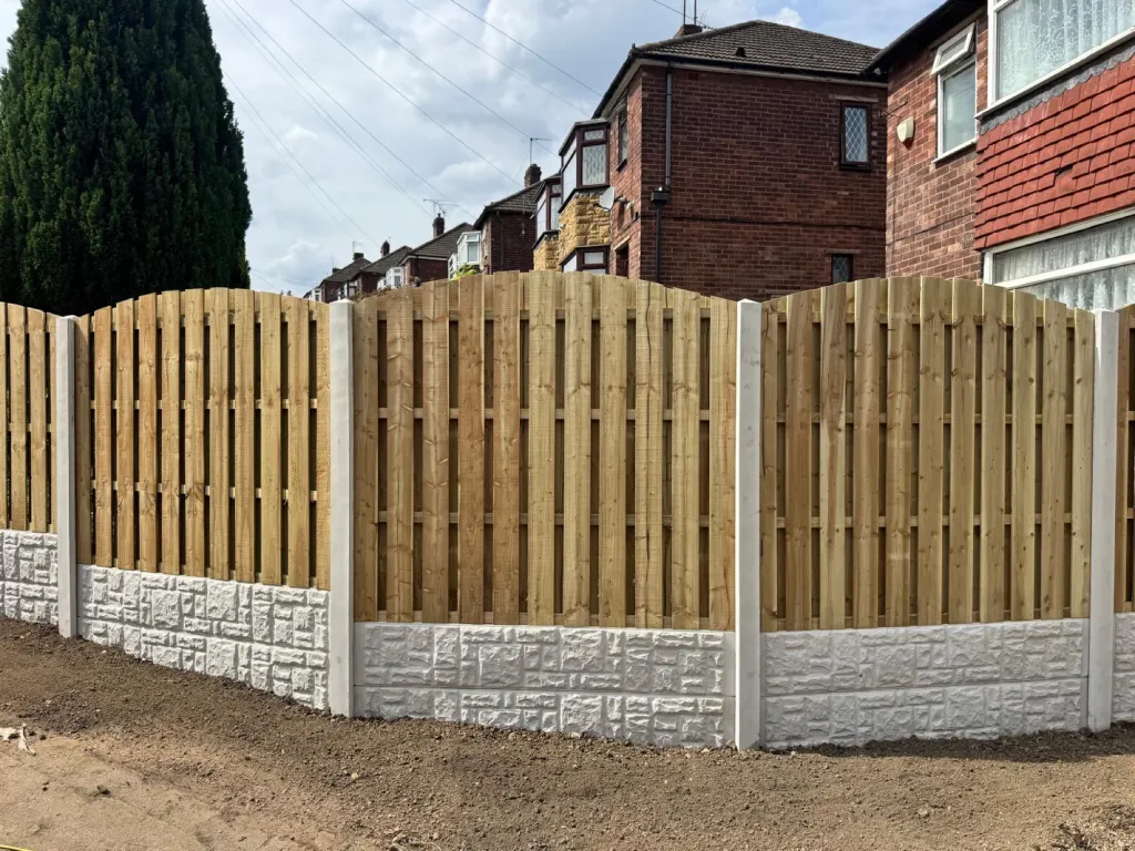 Arched panel fence with concrete posts installed in Sheffield