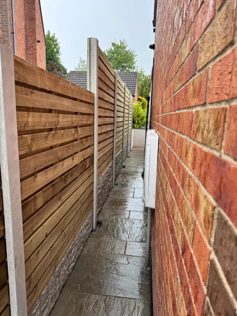 Horizontal Slatted Fence Alongside Driveway by Sheffield Fencing (photo 3)
