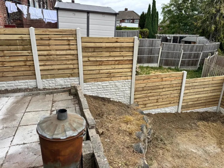 Horizontal Slatted Fencing for a Large Sloping Garden by Sheffield Fencing (photo 4)