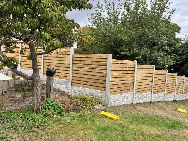 Horizontal Slatted Fencing for a Large Sloping Garden by Sheffield Fencing (photo 6)