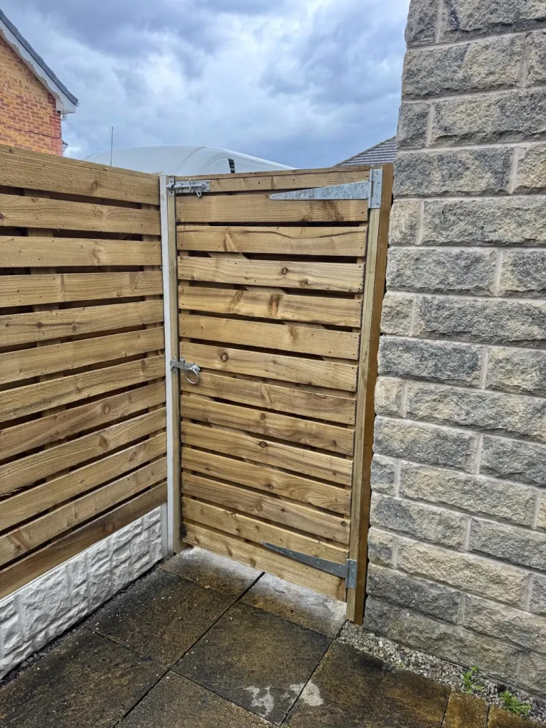 Horizontal Slatted Fence & Matching Gate by Sheffield Fencing (photo 3)